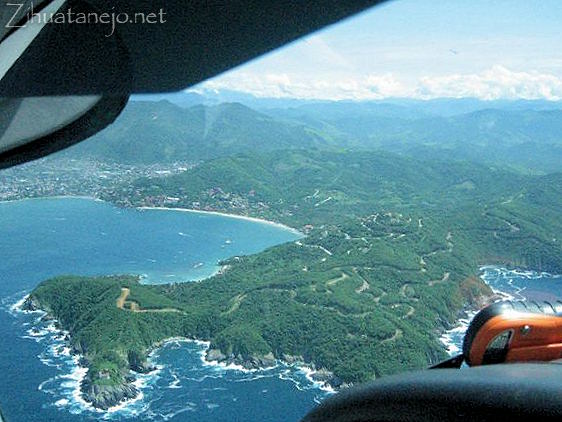 aerial photo of new roads on hills above Las Gatas and La Ropa beaches aerial photo of new roads on hills above Las Gatas and La Ropa beaches